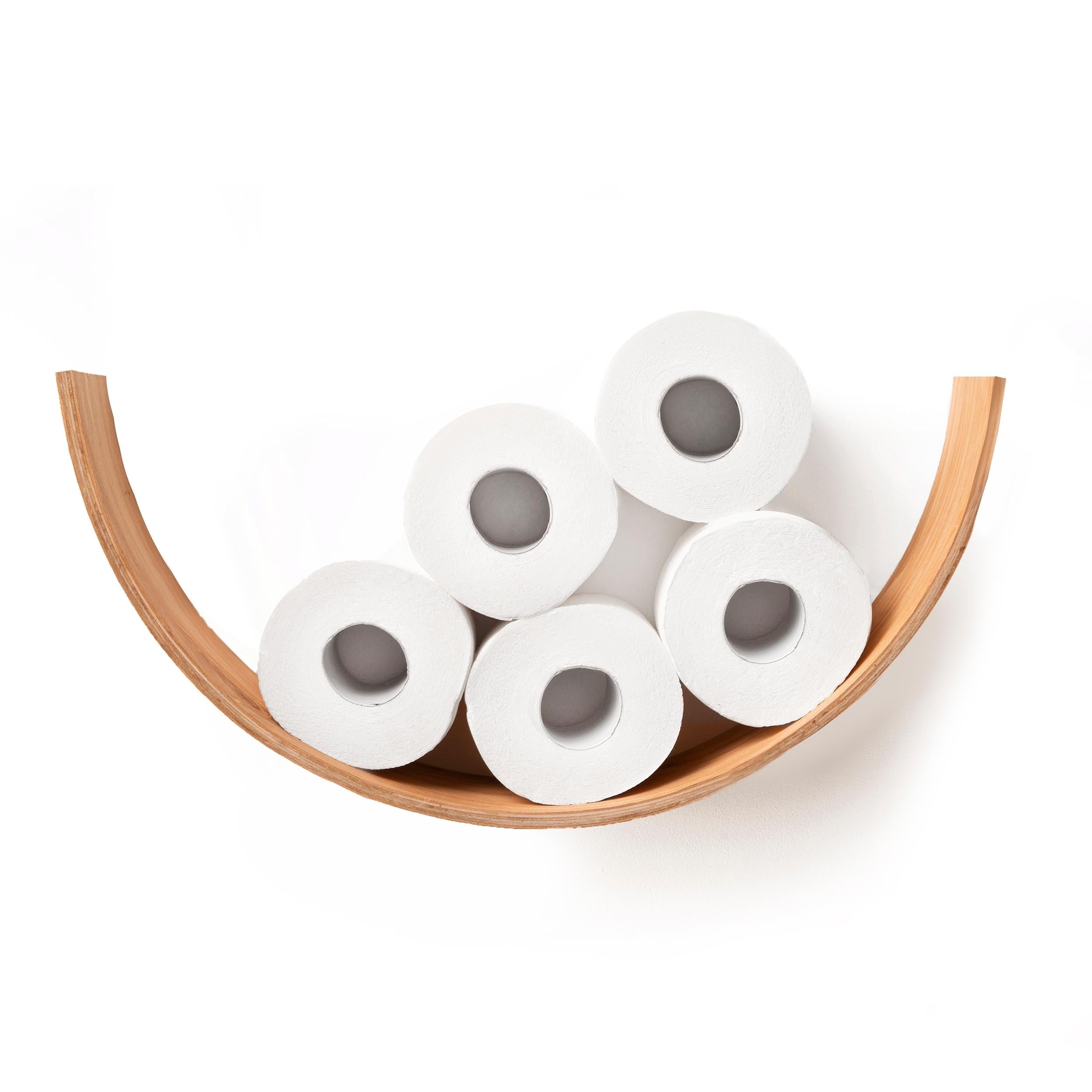 Front view of a cherry wood curved toilet paper holder, holding five rolls of toilet paper in a neat arrangement.